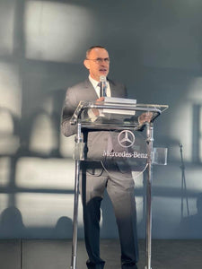 Close Up Shot of Speaker at Mercedes-Benz Event